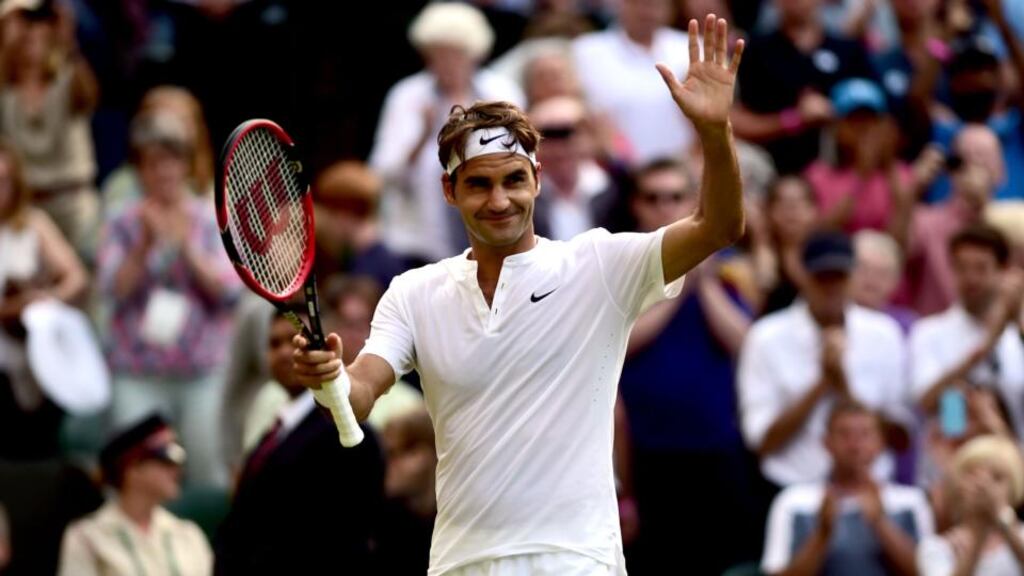Roger Federer celebrates victory over Roberto Bautista Agut during day Seven of the Wimbledon Championships. Photo: Adam Davey/PA
