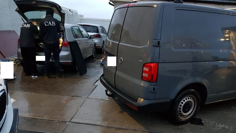 Cab officers search a vehicle during a search operation on Wednesday.