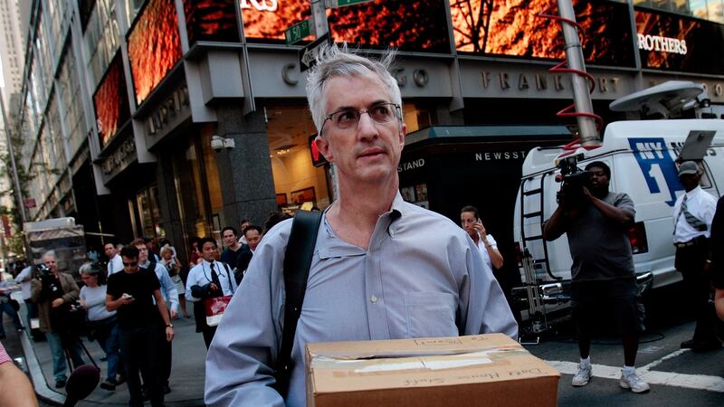 An employee of Lehman Brothers carries a box out of the company’s headquarters on September 15th, 2008, in New York City. File photograph: Chris Hondros/Getty Images