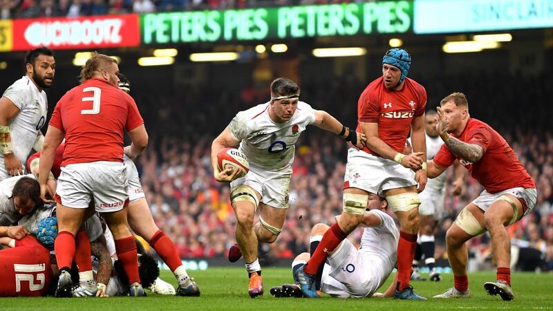 Tom Curry of England goes over for the first try. Photograph: Dan Mullan/Getty Images