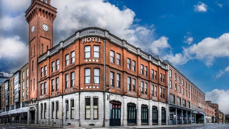 John Malone has added a number of Irish hotels to his property portfolio, including the Westin and Trinity City Hotel (above) in Dublin 2. Photograph: Cyril Byrne
