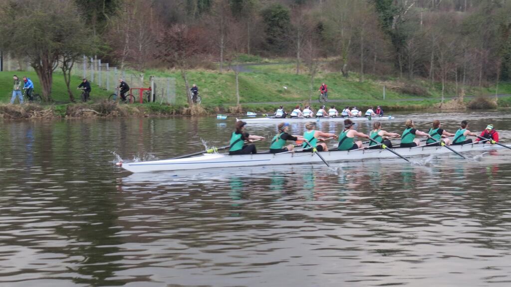 Neptune on the way to beating Commercial in the final of the women’s Club Eight at Commercial Regatta on Sunday night. Photograph: Liam Gorman