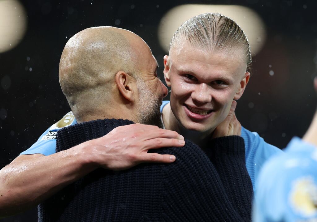 Pep Guardiola, manager of Manchester City, and Erling Haaland. Photograph: Catherine Ivill/Getty