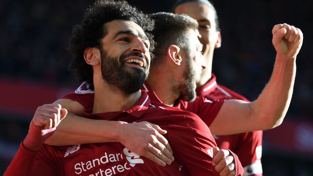 Liverpool’s Egyptian attacker Mohamed Salah celebrates scoring against Cardiff City at Anfield. Photograph: Getty Images