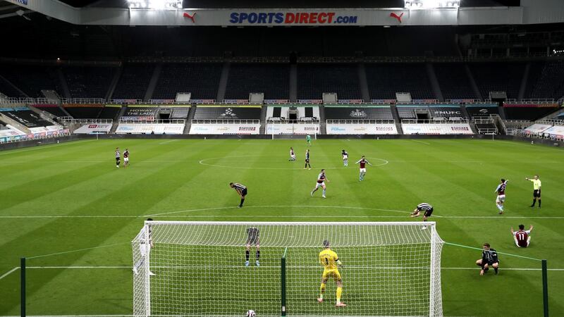 Ciaran Clark (bottom right) reacts after his own goal gave Aston Villa the lead against Newcastle. Photograph: Clive Brunskill/PA