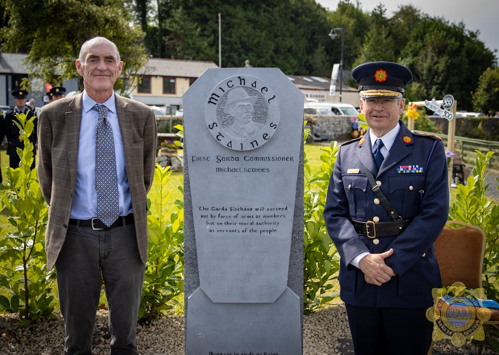 Garda Commissioner Drew Harris (right) with Michael Staines at a memorial in Newport, Co Mayo, to his grandfather, also Michael Staines, who became the first Garda commissioner 100 years ago. Photograph: Garda press office