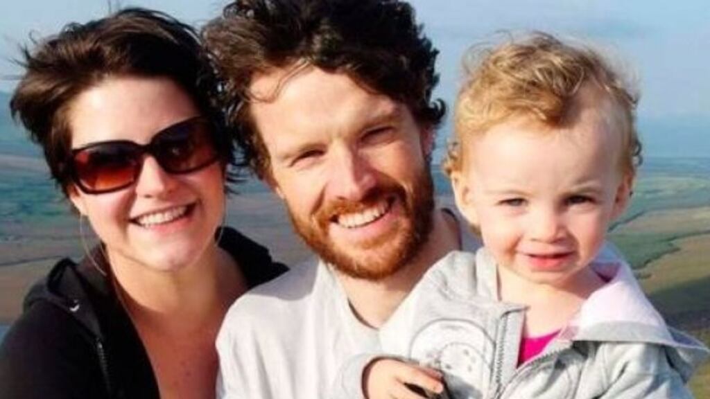 Estlin Wall with her parents Amy and Vincent.