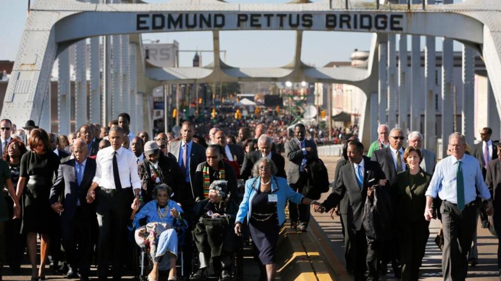 President Barack Obama participates in a march across the Edmund Pettus Bridge in Selma, Alabama. Photograph: Jonathan Ernst/Reuters