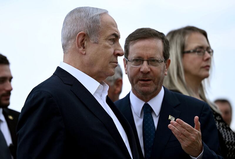 Binyamin Netanyahu and Israel's president Isaac Herzog waiting for the arrival of US president Joe Biden in Tel Aviv last week. Photograph: Brendan Smialowski /AFP via Getty Images