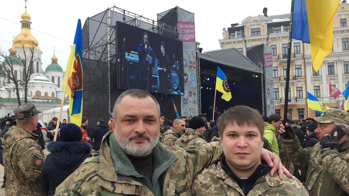 Wolf (left) and Tank, the noms de guerre of Ukrainian soldiers at a concert in Kiev on Saturday in memory of servicemen killed in the 2015 Battle of Debaltseve. Photograph: Daniel McLaughlin