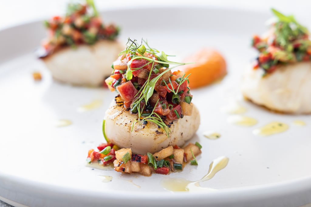 Grilled scallops with an apple, pepper and vinegar dressing. Photograph: Harry Weir Photography