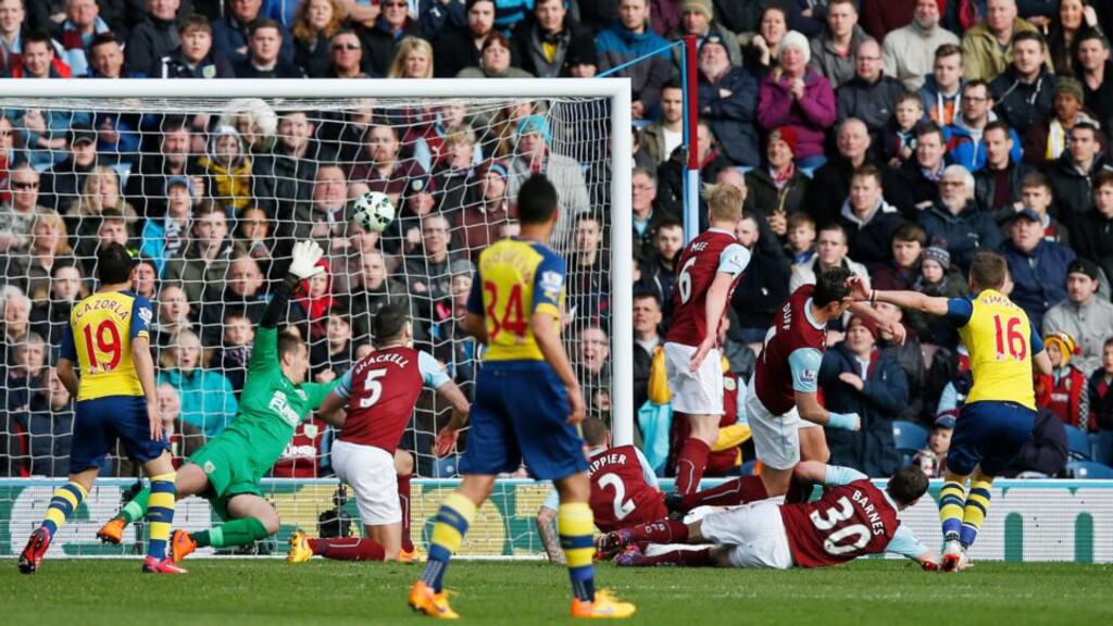 Aaron Ramsey’s first half strike at Turfmoor made it eight wins on the bounce for Arsenal. Photograph: Reuters