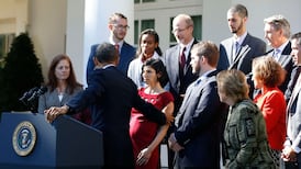 Video: Obama catches fainting woman during speech