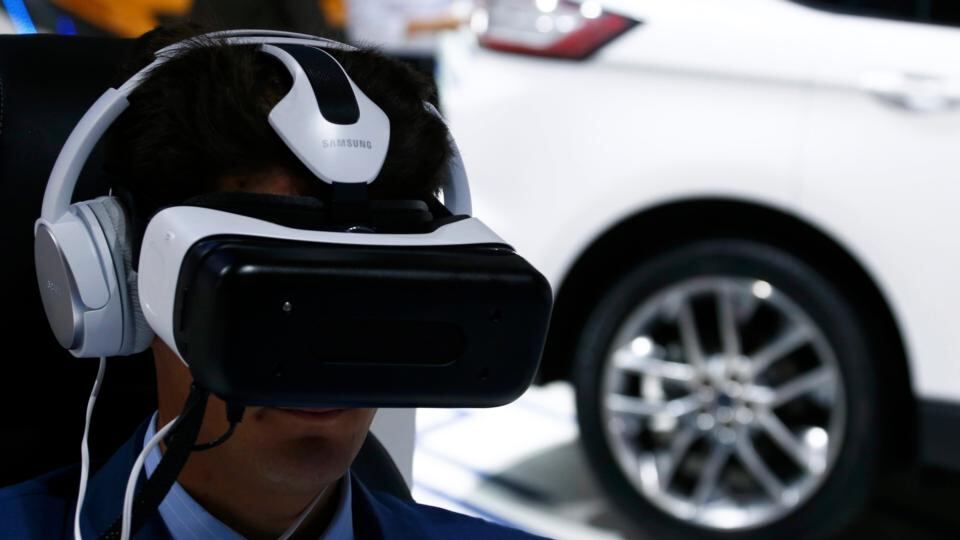 A visitor wears a Samsung Gear VR headset as he tries a virtual reality drive of a Ford Edge car during the media day at the Frankfurt Motor Show. Photograph: REUTERS/Ralph Orlowski