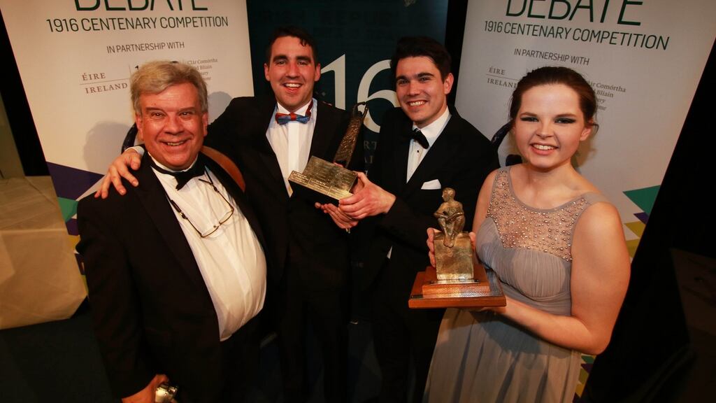 At The Irish Times Debate final, individual winner Clíodhna Ní Chéileachair and team winners Ross O’Mahony and Aaron Vickery (centre) are joined by adjudicator Prof Brent Northup of Carroll College, Montana. Photograph: Nick Bradshaw