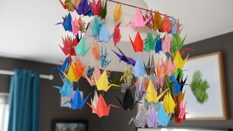 Hand-made Origami lampshade made by Przem Shrem Zajac’s Portuguese friend Joana at his home in Smithfield. Photograph: Dara Mac Dónaill