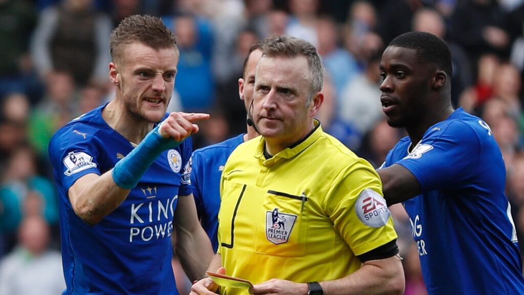 Leicester City’s Jamie Vardy reacts after being shown a red card by referee Jonathan Moss for a second yellow card for simulation during the Premier League football against West Ham. Photograph: Adrian Dennis/AFP/Getty Images
