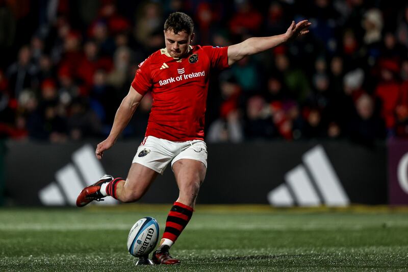 Munster's Tony Butler takes a kick. Photograph: Ben Brady/Inpho
