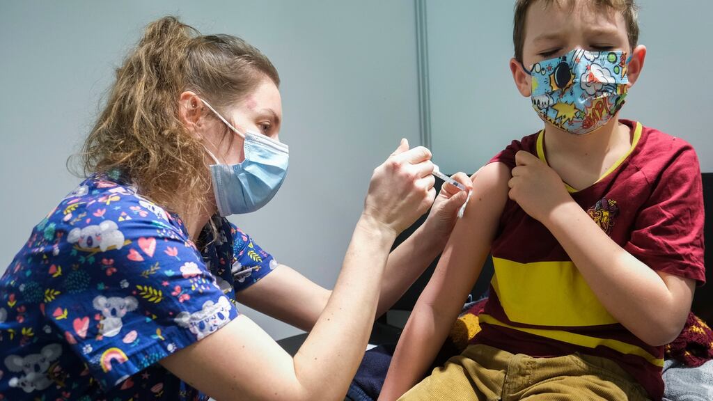 A six-year-old boy receives the first jab of the Pfizer Covid-19 vaccine in Namur, Belgium, on Thursday. Photograph: Olivier Hoslet/EPA