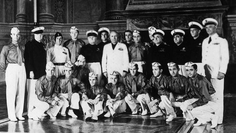 Duce Benito Mussolini (C, in white) with Italy’s 1938 World Cup winners. Photograph: Staff/AFP