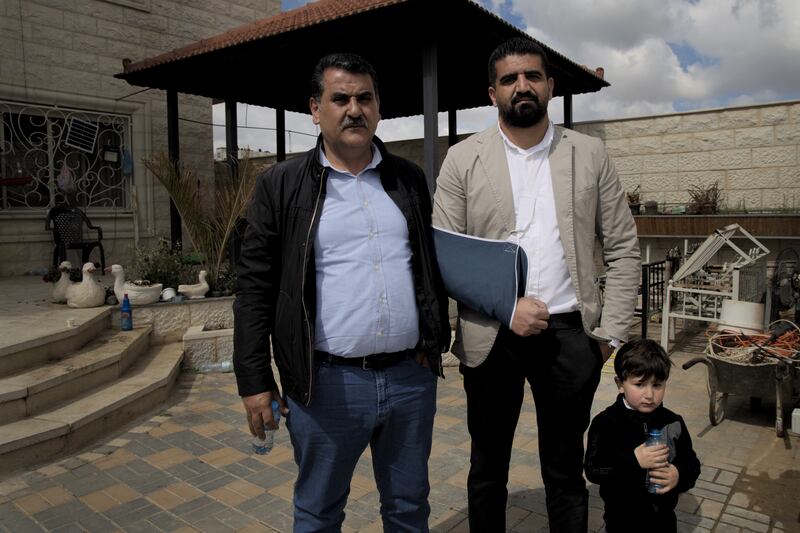 Amar Dumeidi described how settlers beat him and broke his arm while members of the Israeli military looked on. 'We do not want the people to still believe that the Israeli occupation is the victim here,' says the mayor of Huwara, Moein Dumeidi. Photograph: Hannah McCarthy
