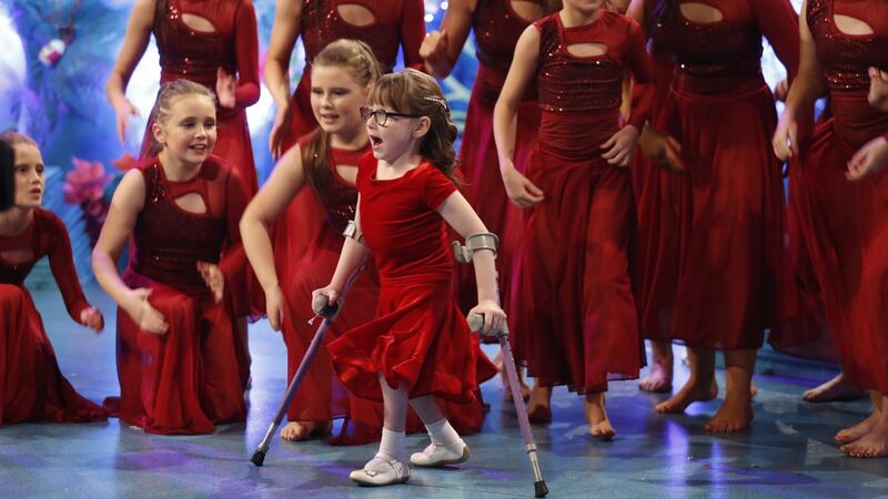 Ava O’Donovan, age 7 from Kildare dances the Cha-Cha with her crutches. Photograph: Andres Poveda