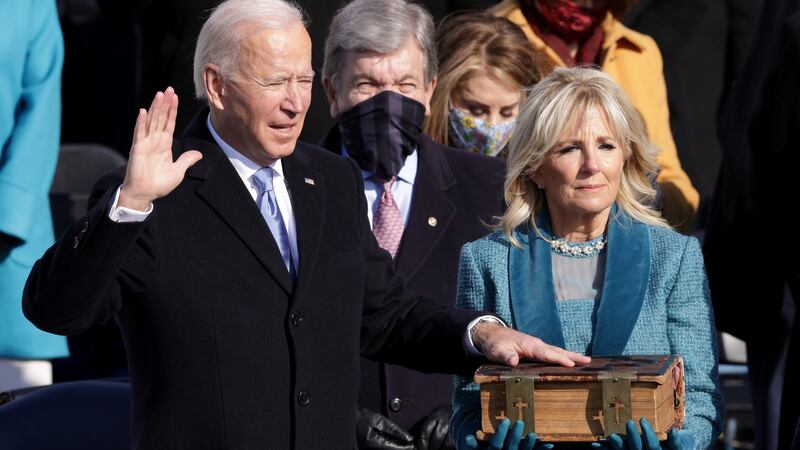 Joe Biden is sworn in as U.S. President as his wife Dr Jill Biden looks on. Photograph: Alex Wong/Getty Images