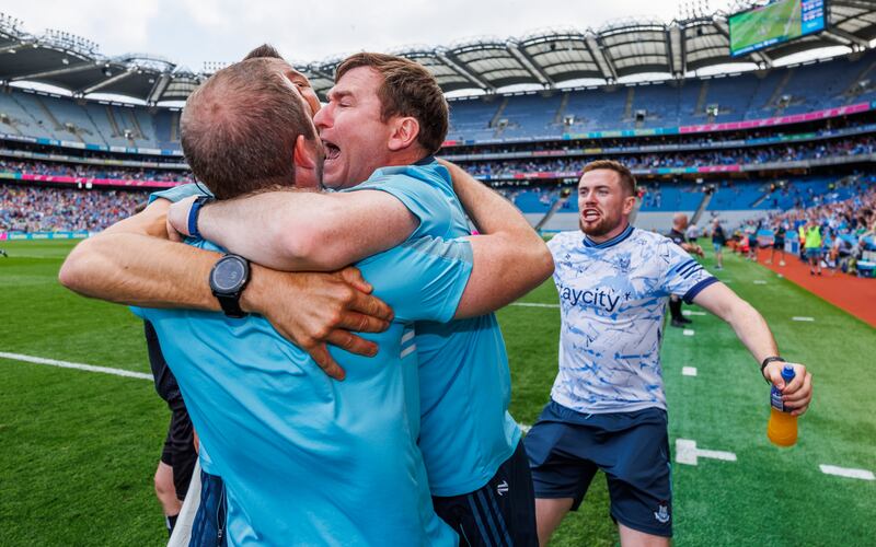 Dublin manager Niall Ó Ceallacháin celebrates with staff after beating Limerick in the All-Ireland quarter-final. Photograph: James Crombie/Inpho