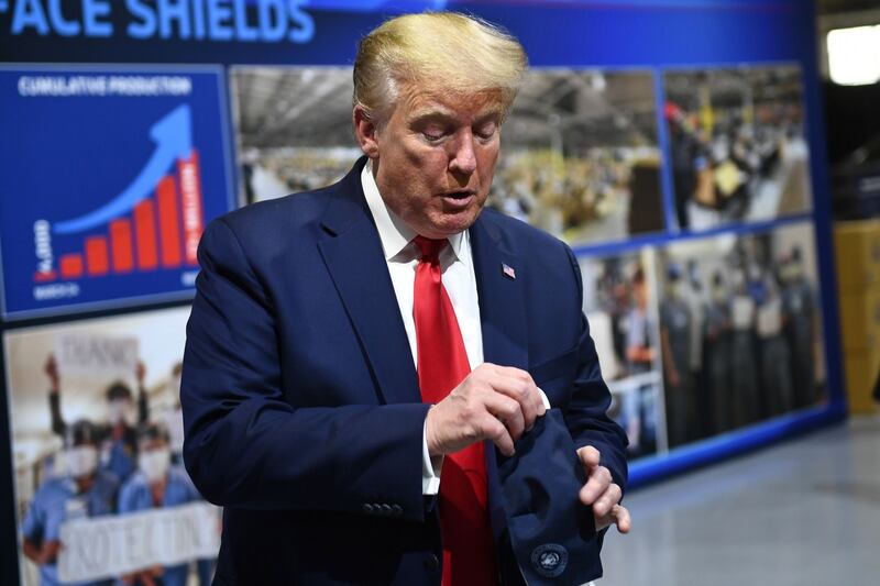 US president Donald Trump removed his mask for the public part of tour of the Ford Rawsonville Plant in Ypsilanti, Michigan on May 21st, saying he ‘didn’t want to give the press the pleasure of seeing it’. Photograph: Brendan Smialowski/AFP via Getty