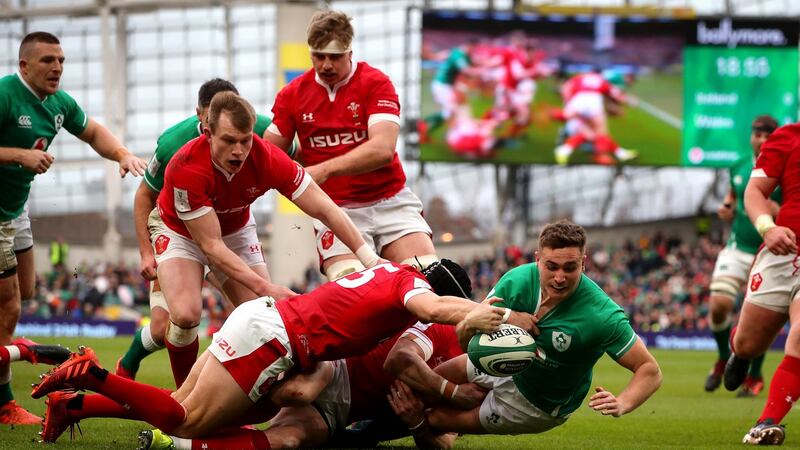 Jordan Larmour scores the first try of the game. Photo: Ryan Byrne/Inpho