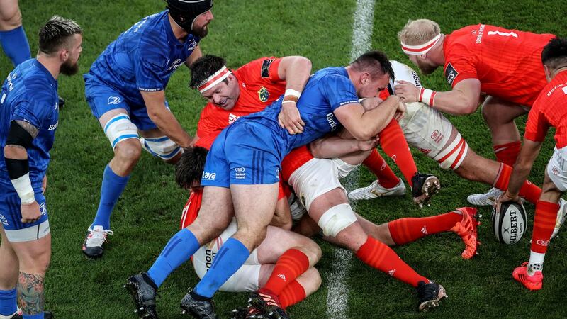 Leinster’s Ronan Kelleher competes against Billy Holland of Munster in a ruck. Photograph: Dan Sheridan/Inpho