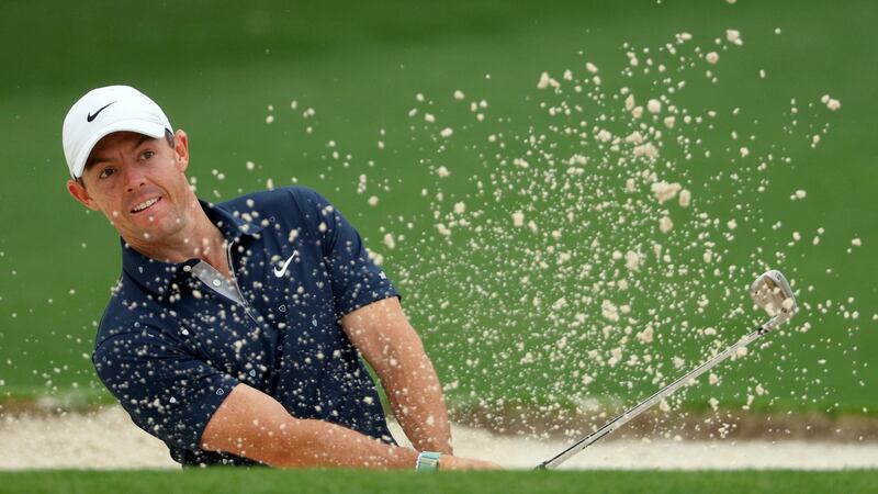 Rory McIlroy plays a shot from a bunker on the second hole during a practice round prior to the Masters at Augusta National Golf Club. Photograph: Andrew Redington/Getty Images