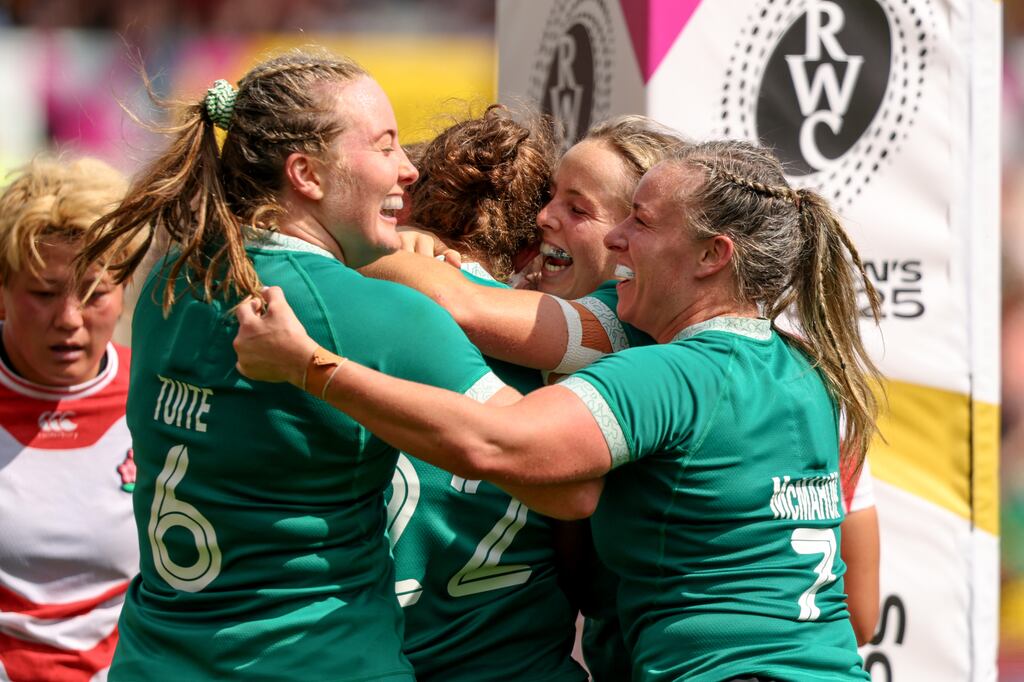 Ireland's Enya Breen celebrates scoring a try with Fiona Tuite, Aoibheann Reilly and Edel McMahon during the Rugby World cup Pool C game against Japan at Franklin's Gardens. Photograph: Ben Brady/Inpho