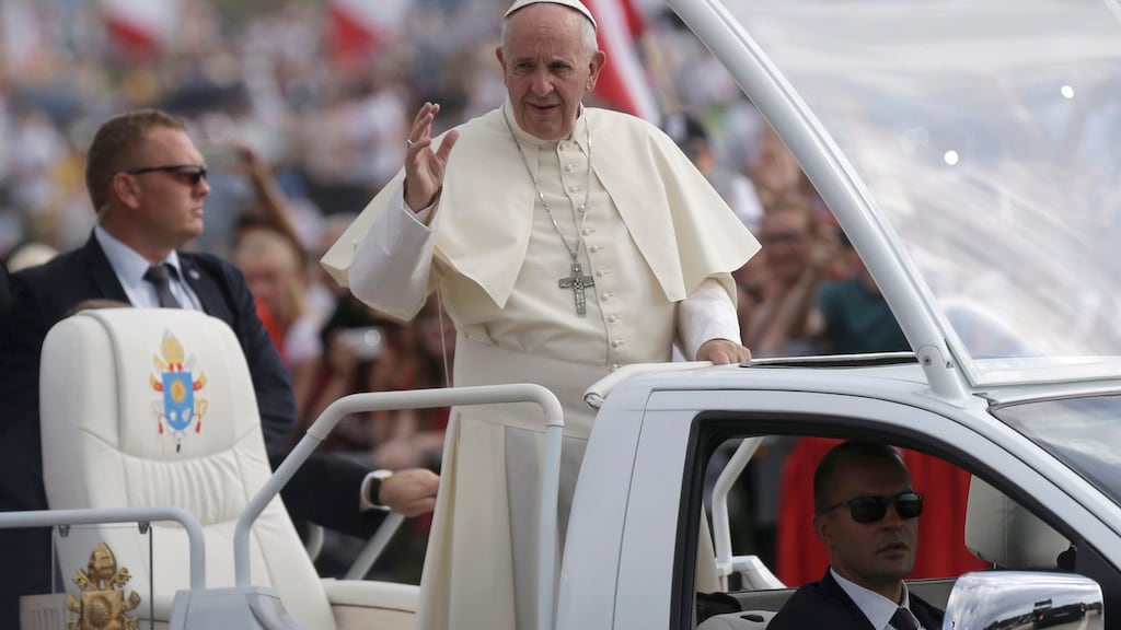 Pope Francis greets faithful as he arrives to the Campus Misericordiae during World Youth Day in Brzegi near Krakow, Poland, Sunday. Photograph: Reuters/David W Cerny
