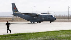 Turkey presents body of shot-down pilot to Russia