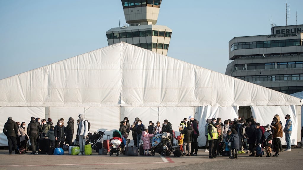 Refugees from Ukraine arrive at a newly built arrival centre on the tarmac of the former Tegel airport in Berlin. Photograph: Steffi Loos/AP