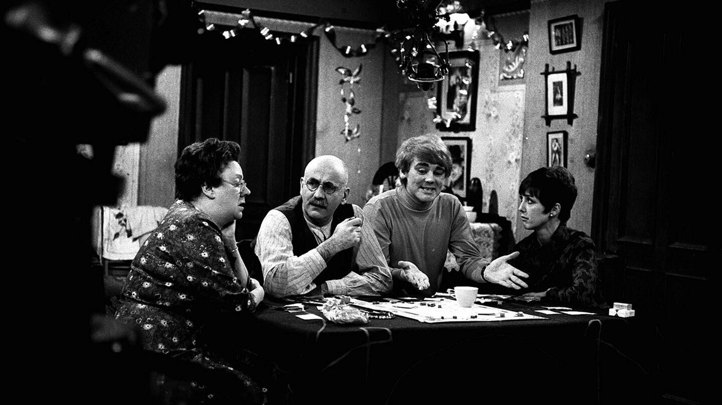 Left to right: Dandy Nichols, Warren Mitchell, Tony Booth and Una Stubbs on the set of the BBC comedy Till Death Us Do Part. Photograph. PA Wire