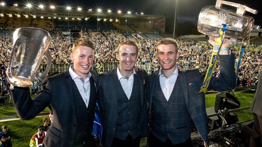 Tipperary minor captain Brian McGrath and Senior players Noel and John McGrath. Photograph: James Crombie/Inpho