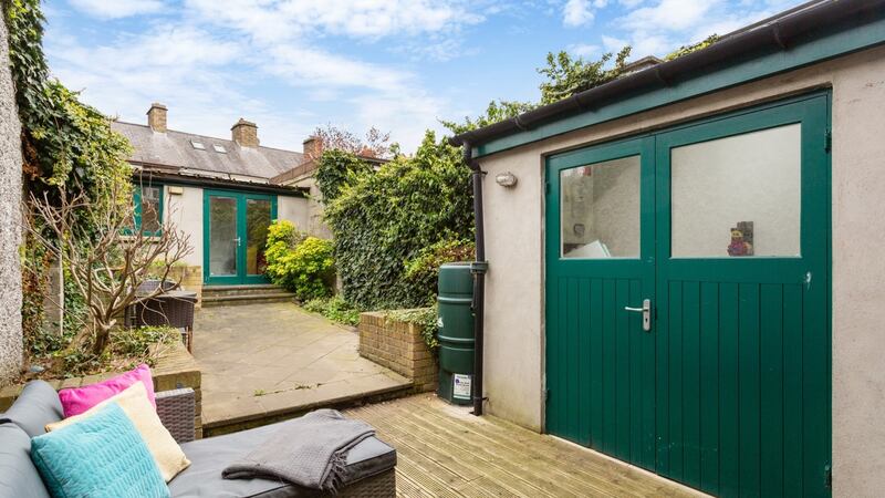The rear garden space and detached home office