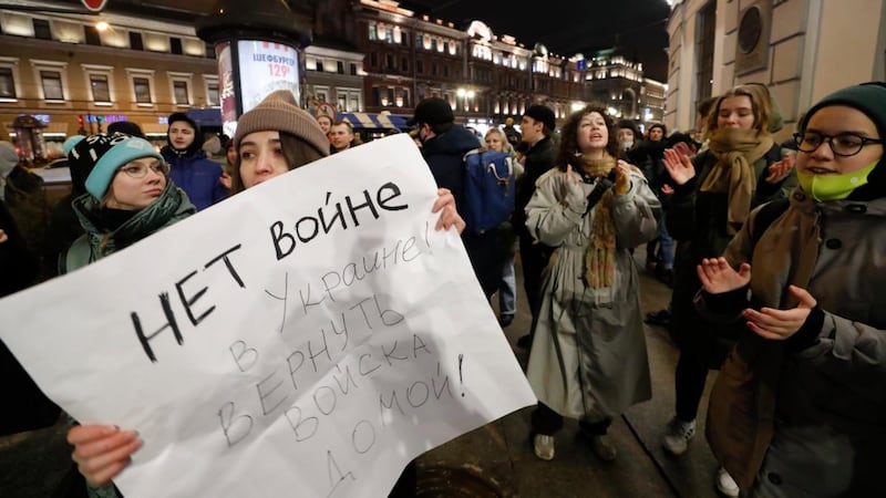 Protesters hold posters that read ‘No War’ during rally against the invasion of Ukraine in Saint Petersburg. Photograph: Anatoly Maltsev/EPA