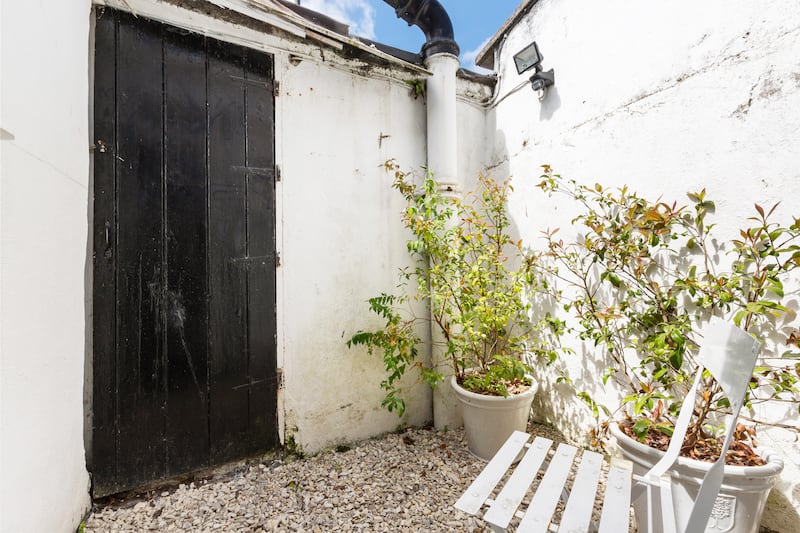 The propery has a west-facing city garden to the rear