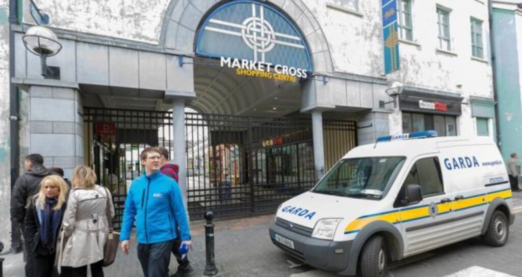 A Garda van outside the Market Cross shopping centre in Kilkenny where a woman died after being stabbed on Thursday night. Photograph: Dylan Vaughan