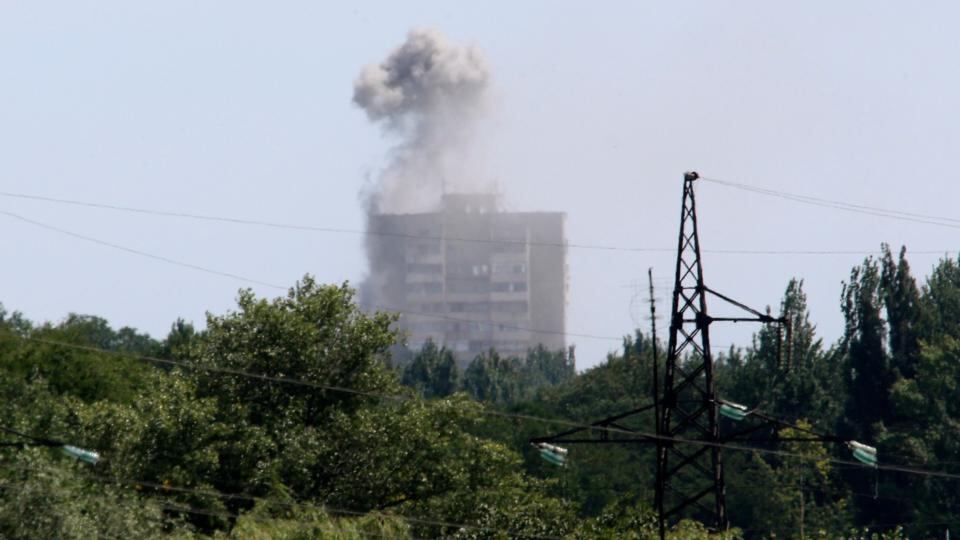 Smoke rises above a damaged multi-storey block of flats following what locals say was shelling by Ukrainian forces in Shakhtarsk, Donetsk. Photograph: Sergei Karpukhin/Reuters Smoke rises above a damaged multi-storey block of flats following what locals say was shelling by Ukrainian forces in Shakhtarsk, Donetsk. Photograph: Sergei Karpukhin/Reuters