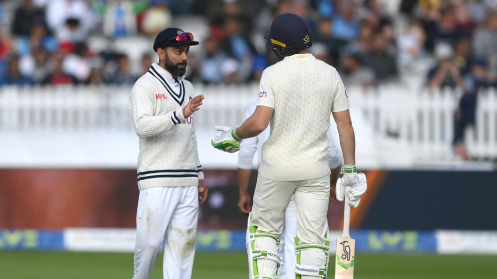 India captain Virat Kohli and Jos Buttler have a chat during day five of the second Test at Lord’s. Photograph: Stu Forster/Getty Images