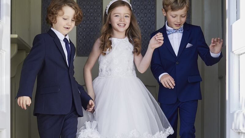 Hayley: dress, €100; beaded hairband €15 by Paul Costelloe for Dunnes Stores. Boys’ blazer, €40, waistcoat, €20, trousers, €25, shirt €20, navy tie and bow tie, €5 each.