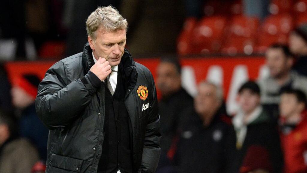Manchester United manager David Moyes shows his dejection as he leaves the pitch following his side’s FA Cup defeat tot Swansea City at Old Trafford, Manchester. Photo: Martin Rickett/PA