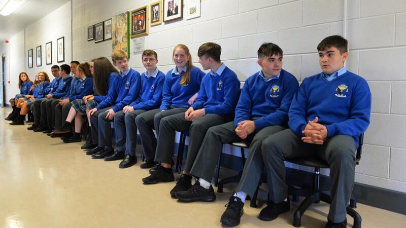 Eight sets of twins: Michelle and Noelle Curtin, Shona and Caoimhe Hickey, Micah and Ryan O’Connell, David and Jack O’Connor, Christopher and Chloe Lane, Maeve and Orla Quirke, and Holly and Luke Scannell wait for their Junior Cert results at Coláiste Íde agus Iosef. Photograph: Domnick Walsh/Eye Focus