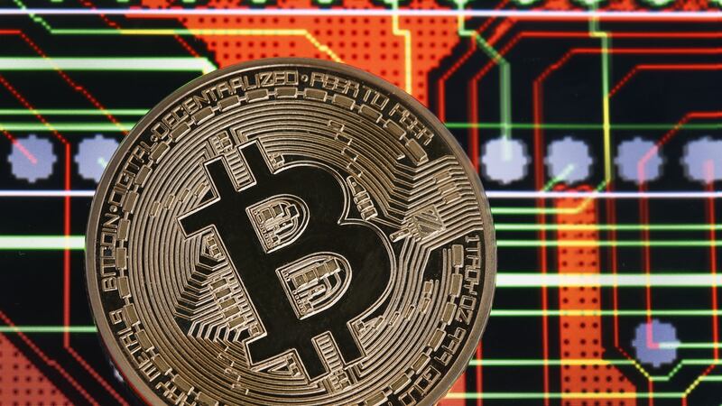 A visual representation of the digital cryptocurrency, Bitcoin. Photograph: Chesnot/Getty Images
