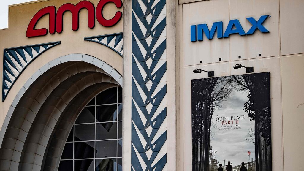 An AMC movie theater in Maryland, US. AMC’s share price nearly doubled on Wednesday, a day after it issued 8.5 million shares to Mudrick Capital, which the hedge fund flipped at a profit. Photograph: Jim Watson/AFP