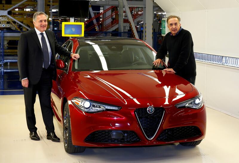 Former Fiat Chrysler chief executive Sergio Marchionne and departing chief operating officer Alfredo Altavilla. Photograph: Tony Gentile/Reuters